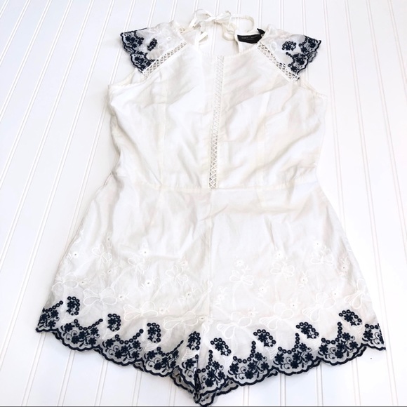 Romeo & Juliet Couture Pants - ROMEO + JULIET White Romper With Navy Blue Crochet